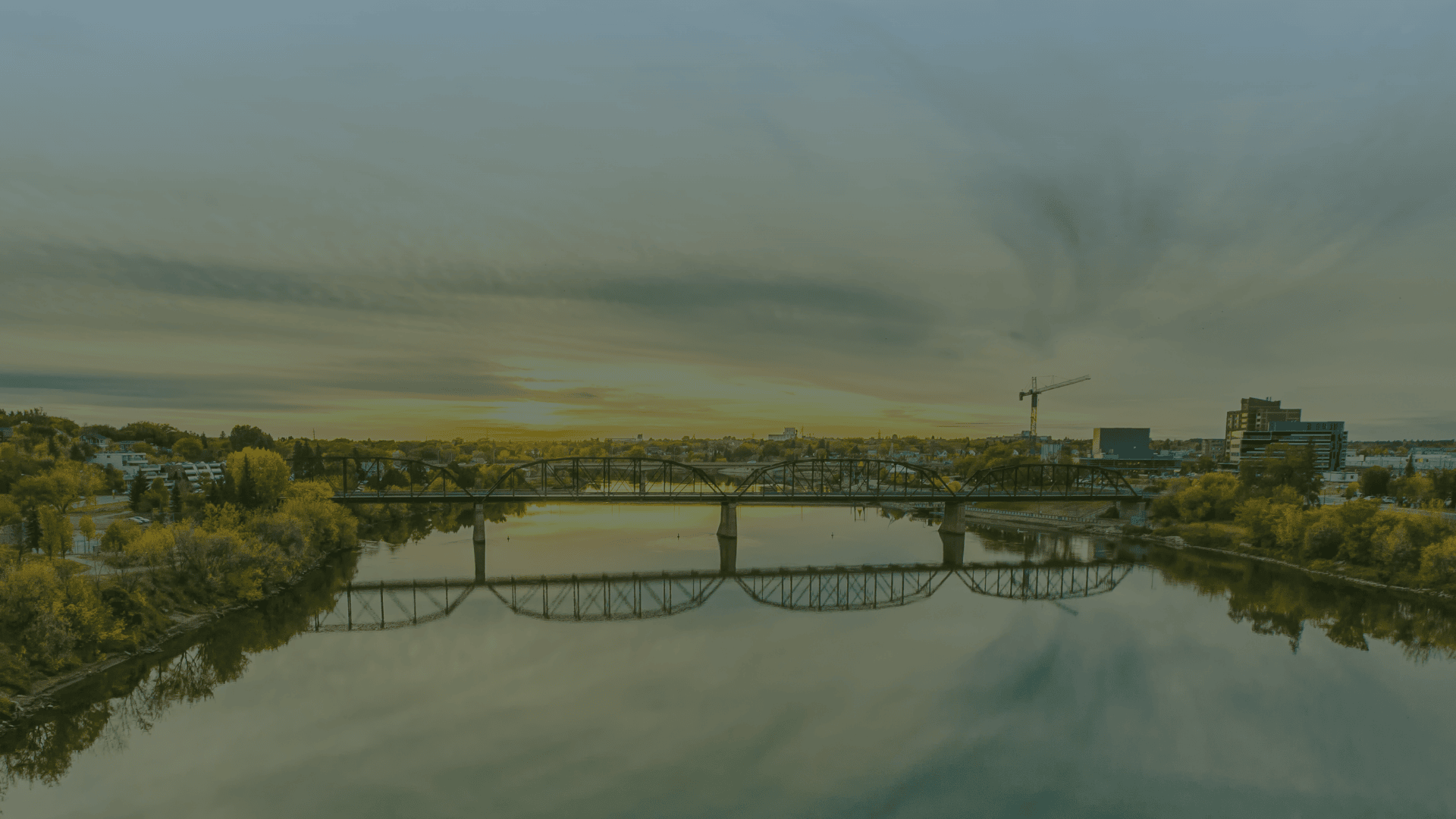 River bridge at sunset, SHARP 2026 banner